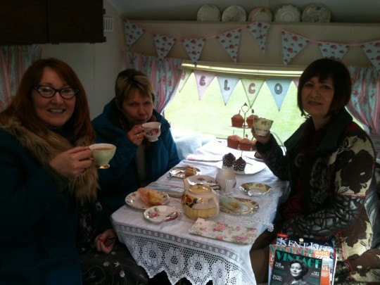 Friends find a warm and cosy welcome and a hot cuppa in Bessie in between shopping at the Quex Vintage Fair